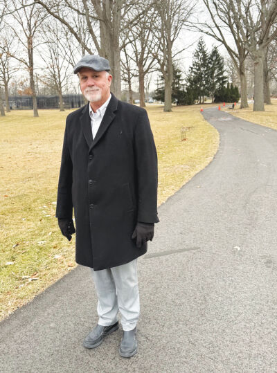  Retired Grosse Pointe Woods City Manager Frank Schulte stands on the walking path at Ghesquiere Park, which was one of his favorite projects. 