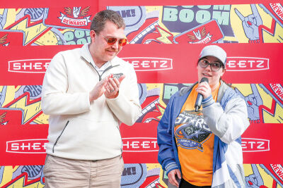  Rick Brady, Special Olympics Michigan representative, and Special Olympian Cassidy speak at the Sheetz grand opening celebration. 