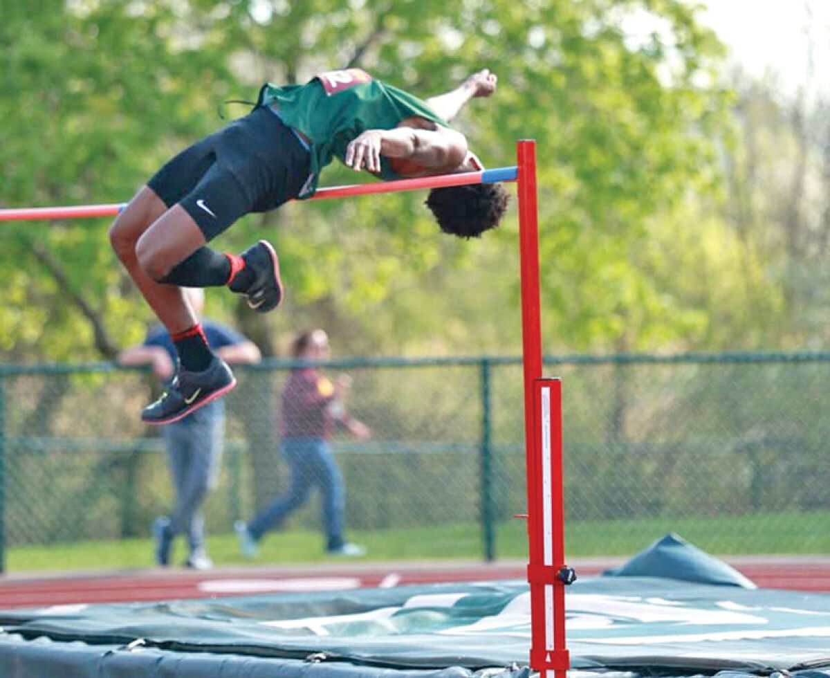  Drelen Lillard performs a high jump during a recent competition at Novi High School. 