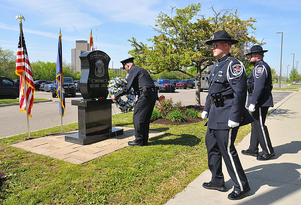  Southfield Police Department Detective Brian Weeks places a wreath at the monument dedicated to fallen Southfield police officers. The Southfield Police Department held its annual police memorial ceremony on May 8. 