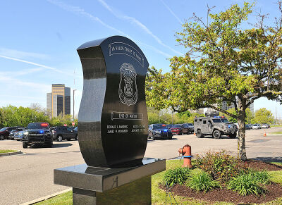  A monument to fallen Southfield Police Department officers Donald Harding and James McMahon stands in front of the department.  