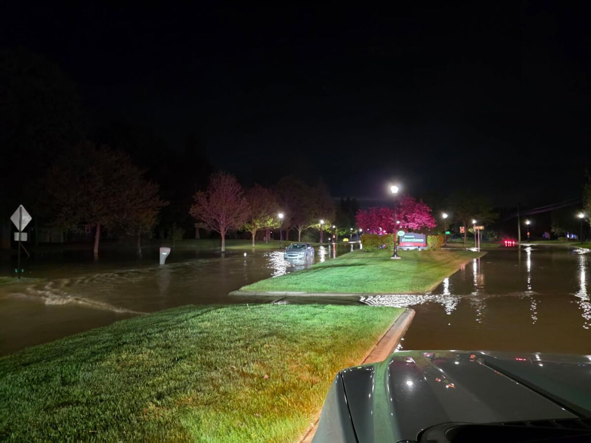  A 42-inch water transmission pipe broke in River Woods Park in Auburn Hills, flooding the nearby roads May 10. 