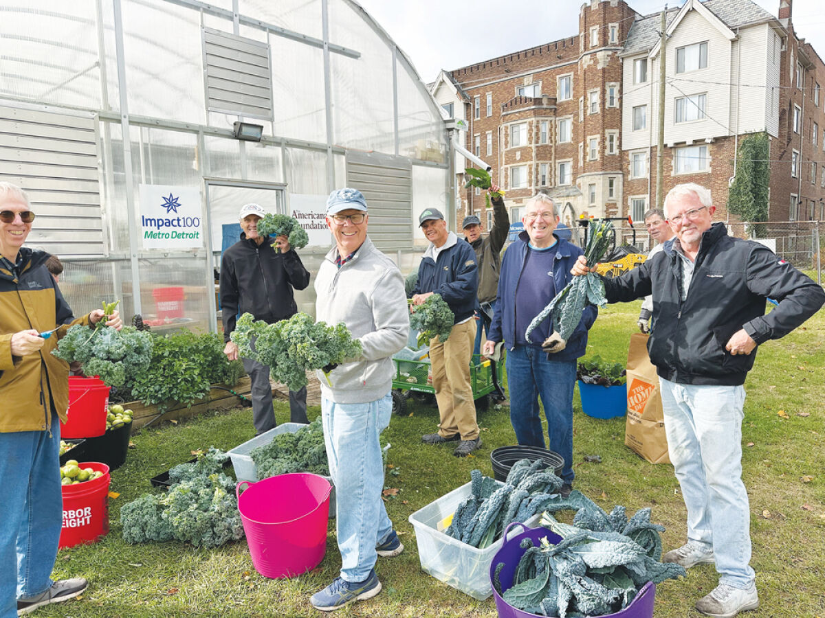  Members of the Senior Men’s Club of Birmingham volunteer at a garden cleanup event. The club offers its members a variety of activities and volunteer opportunities. 