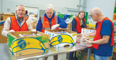  The Senior Men’s Club of Birmingham, open to all men aged 55 and older, prides itself on offering its members fellowship, shared values and community service efforts. Pictured here, members of the Senior Men’s Club of Birmingham volunteer at Forgotten Harvest. 