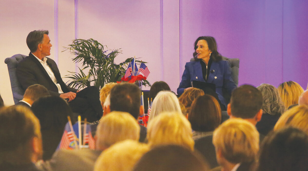  Macomb County Executive Mark Hackel speaks with Governor Gretchen Whitmer for a question-and-answer session on May 11 at the 2026 Governor’s Luncheon in St. Clair Shores. 