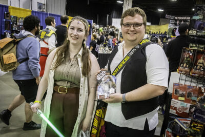  Morgan Steele, left, and Connor Nieman, pose for a photo with a “Star Wars” figure Nieman purchased Saturday, May 16,, at Motor City Comic Con. 