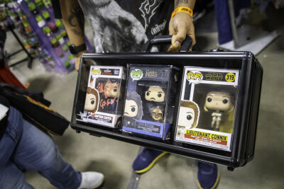  Mario Blanco, 26, of West Chicago, Illinois, shows several Funko Pops that he bought Saturday, May 16, 2026, at Motor City Comic Con. The one of the left is autographed by actress Hayley Atwell, who is a guest at MC3 this year. 
