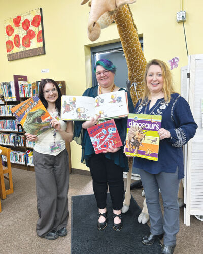  The staff at the Fraser Public Library are looking forward to this year’s summer reading program, the theme of which is “Unearth a Story.” From left are Tina Milosavljevic, library programming assistant; Kristen Getzin, programming and youth services librarian; and Lorena McDowell, library director. 