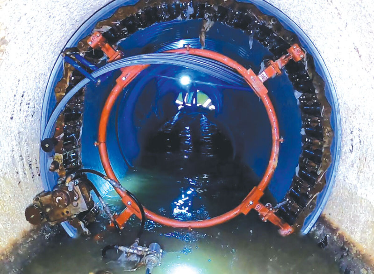  Cured-in-place pipe lining is applied to a sanitary sewer pipe. Over 2.5 miles of CIPP lining will be applied to township sewers this summer. 