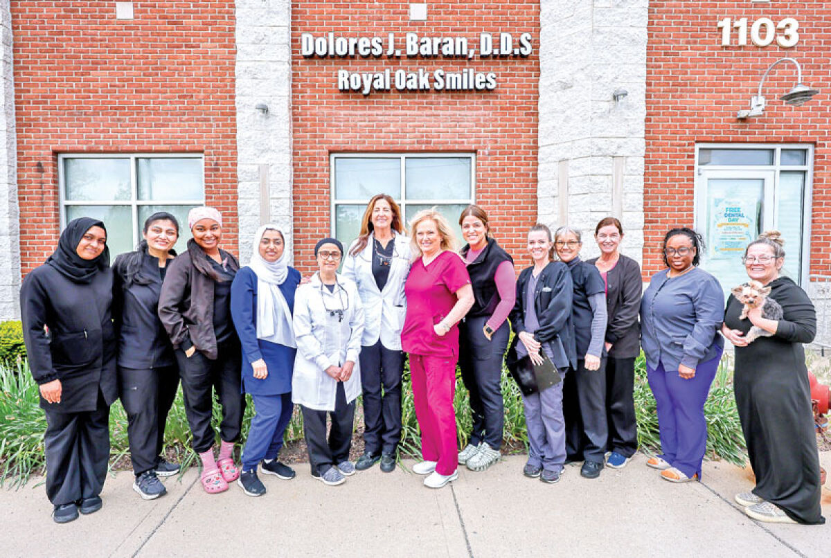  Dr. Dolores Baran enlisted both staff and volunteers to offer free cleanings, fillings and extractions May 15 at Royal Oak Smiles on Main Street. 