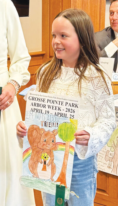  Eleanor Larson is honored for her Arbor Week poster contest entry, which was one of two runners-up. 