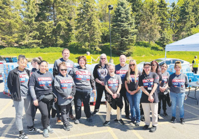 Many people, including Meijer staff, volunteered their time to hand out water. 