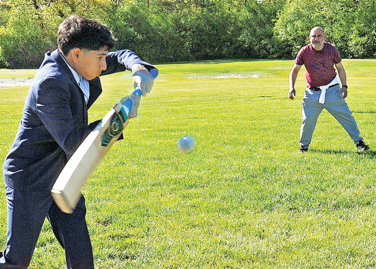  Siddhant Suryawamshi takes his turn at bat on the new cricket field at Boulan Park May 14. 