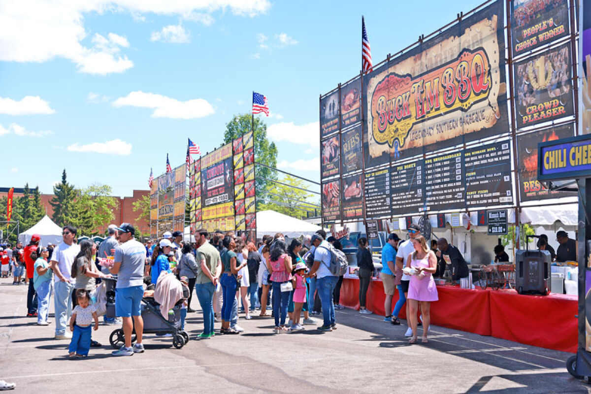  Lines form in front of food trucks during the 2025 Novi BBQ Fest at Twelve Mile Crossing at Fountain View. 