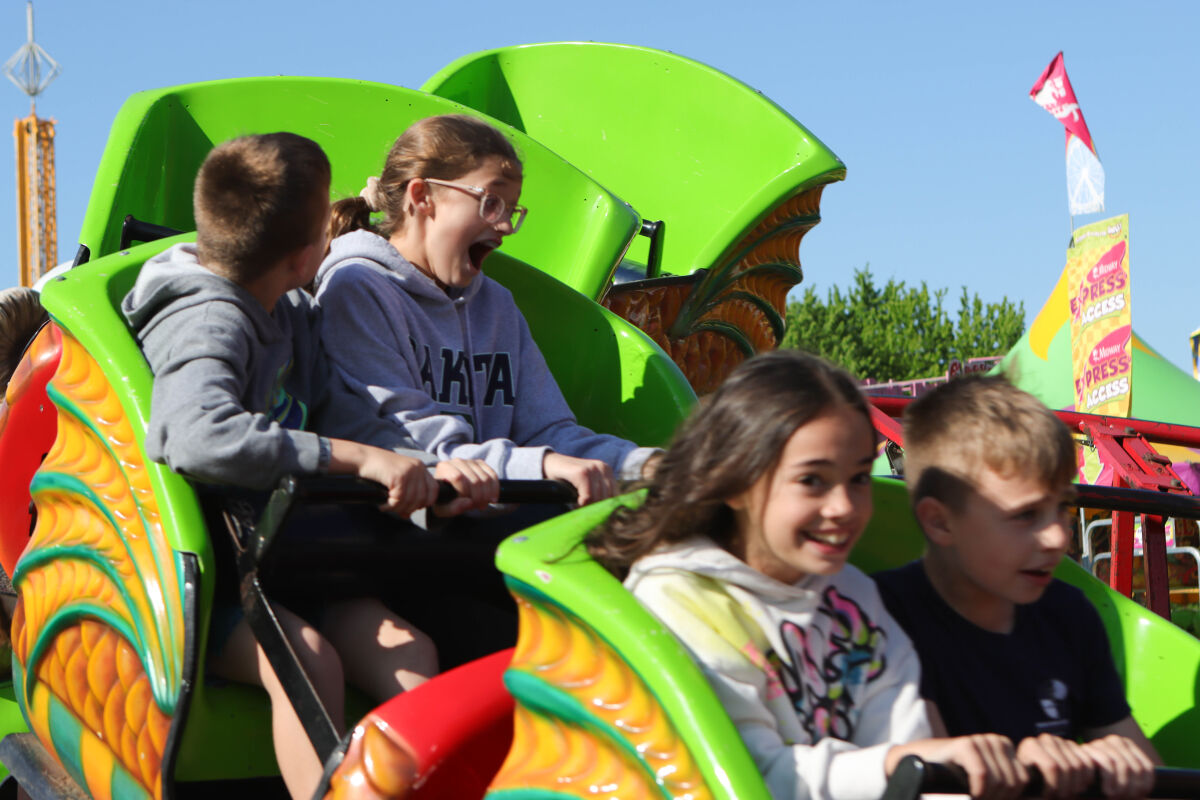  Children enjoy a ride during the Shelby Township Down Home Days Festival two years ago. 