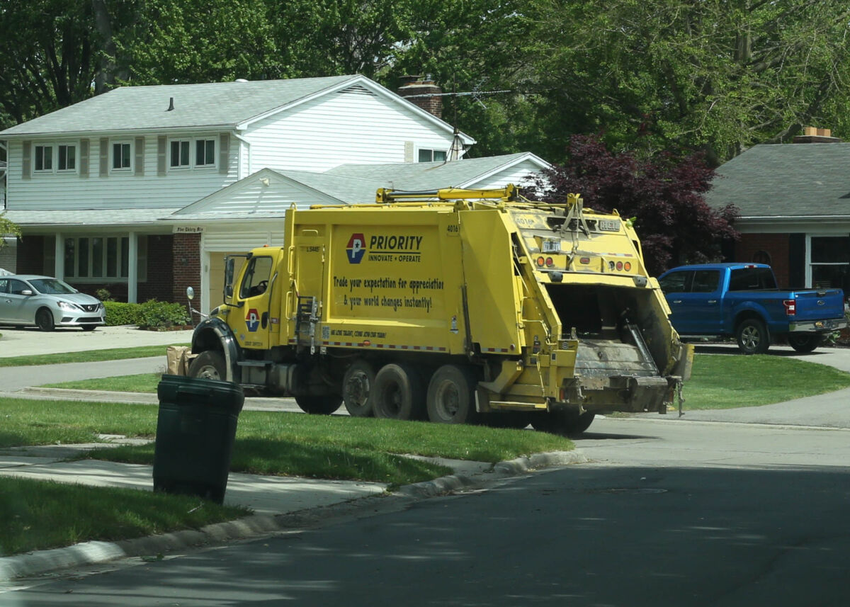  A Priority Waste truck drives through a Mount Clemens neighborhood on May 22. City commissioners raised the residential refuse collection fee from $181 to $183 at the commission’s May 18 meeting. The rate is expected to go up to $185 in 2027. 