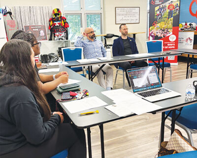  A meeting of the Hazel Park Community Coalition, including Ben Ervin, board president, far right; Richard Shunarrah, business sector representative; Alyssa Dean, student sector representative; and Morgan Cook, student sector representative.  