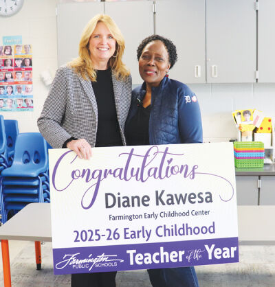  Congratulated by Farmington Public Schools Superintendent Kelly Coffey, left, Diane Kasewa, the district’s Early Childhood Teacher of the Year, said, “There is a fulfillment I get from working with children that I never knew existed  before I became a teacher.”  