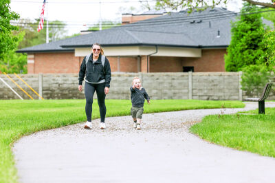  Chelsea Bolsworth, of Roseville, and her son, Dylan Vercruysse, 2, walk the trail around the park as he chases after a bird. 