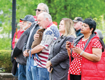  Attendees of the city of Utica’s annual Memorial Day ceremony remember those who died while serving their country.  