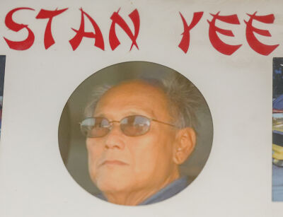  Several photos are displayed at Stan Yee’s Collision Inc. in Eastpointe in honor of Yee and all that he brought to race car driving. 
