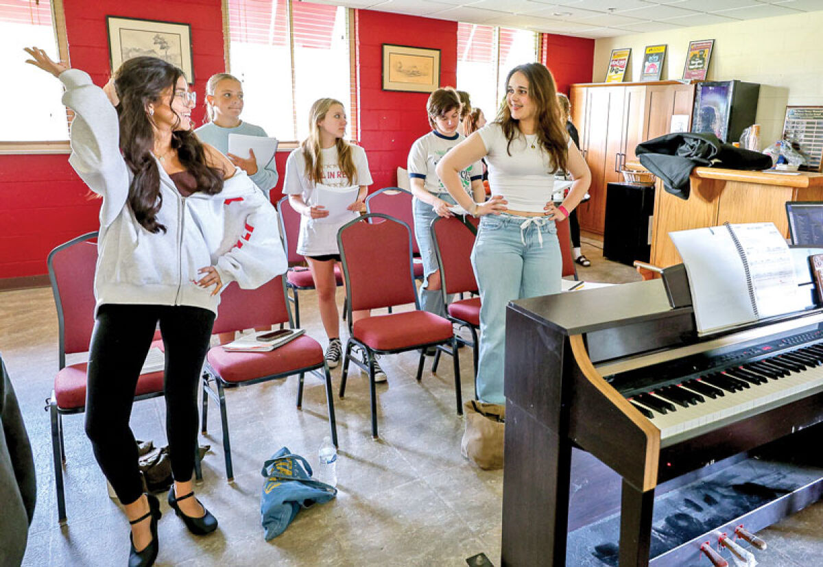  Teen members of the Ridgedale Players rehearse their upcoming romantic comedy musical, “Head Over Heels.” 