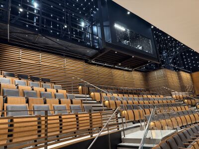  Starry night lights and acoustic paneling on the walls are visible in this photo of the mezzanine. 