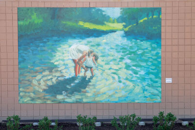  A large mural painted by artist Kären Childs Elder, of Oakland Township, was unveiled within the plaza. 