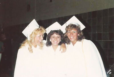  C & G Advertising Sales Representative Christina (Conner) Moeller, Heidi (Boehmer) Formella and Kim (Burkowski) Deinek pose for a picture on their graduation day from Novi High School in 1985. 