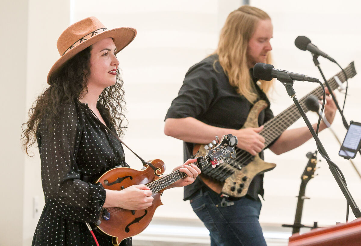  Husband and wife musical duo Ironwood, Mark Pierce and Anna Dorsey, perform at the Arts, Beats & Eats press conference June 9 at Oakland Community College. They also will be performing at the festival when it takes place Sept. 4-7. 