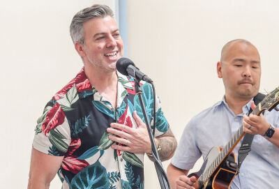  Ben Sharkey, with accompanist Matt LoRusso, performs a song at the Arts, Beats & Eats press conference on June 9 at Oakland Community College. Sharkey will be performing at the new Pride Stage for this year’s festival. 