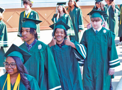  Graduating seniors from West Bloomfield High School file into their graduation ceremony May 27 at Pine Knob Music Theatre in Clarkston. 