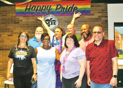  Jadein Black, second from left, back row, is joined by local and state officials following her performance at the shelter building. From left, front row, are Madison Heights City Council members Emily Rohrbach, Toya Aaron and Laurie Geralds, as well as state Rep. Mike McFall, D-Hazel Park. In the back row, left of Black, is Councilmember Bill Mier. To the right of Black is Mayor Corey Haines and Councilmember Quinn Wright.  
