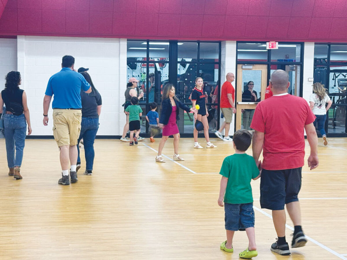  Lake Shore Public Schools celebrated the opening of its new early childhood and community center on June 6. Pictured about to hit a pickleball is State Rep. Mai Xiong. 