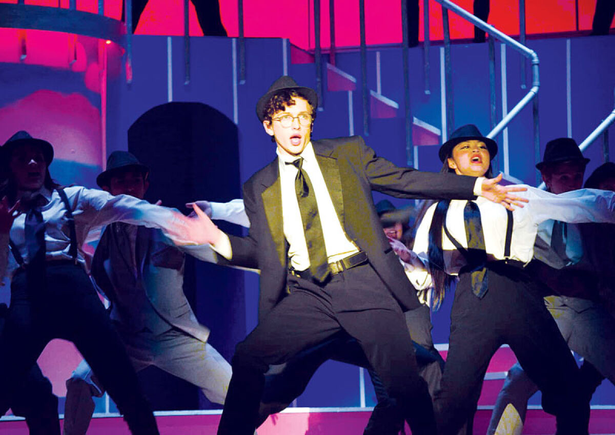  Dakota High School graduate AJ Denomme performs as Carl Hanratty in “Catch Me If You Can” at Dakota in 2026. Denomme was the winner of the Best Male Actor award at the 2026 Sutton Foster Awards and is one of two Michigan students nominated for the 17th annual National High School Musical Theatre Awards. The awards take place in New York City on Monday, June 22. 