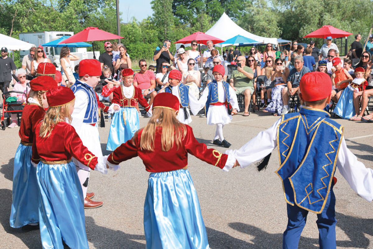  During Troy’s Opa Fest on June 12-14 at St. Nicholas Greek Orthodox Church, kindergarteners and first graders put on a traditional dance. The event celebrates Greek culture. 