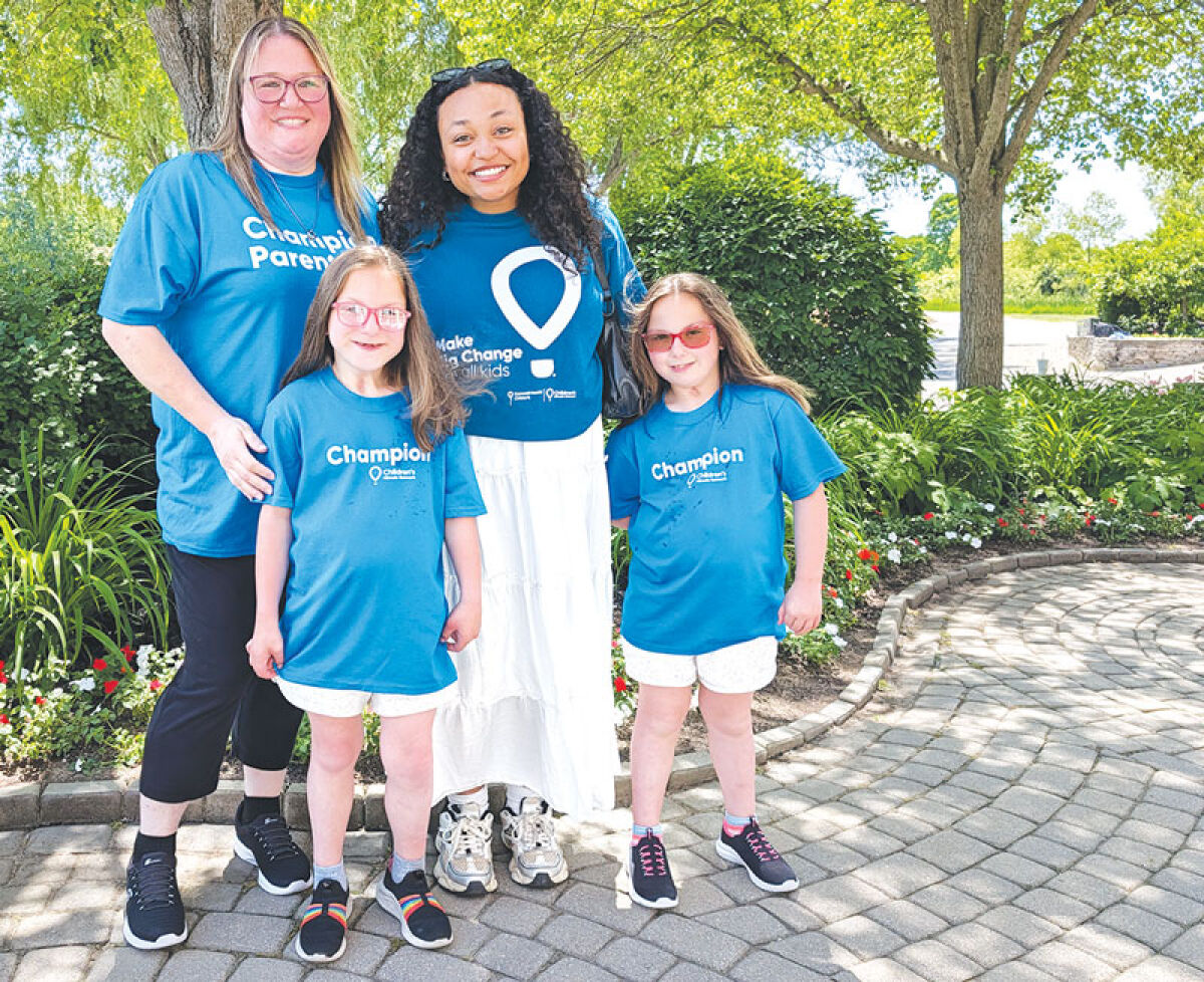  The Papavasiliou family, of Madison Heights, poses for a picture at the Wyndgate Country Club before hitting the course. Pictured are Loula, left, Alexandria, and miracle twins Alicia and Aliya. 