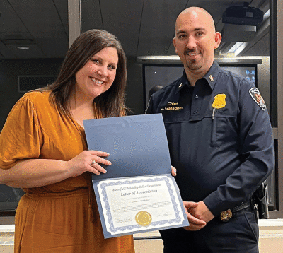  Catherine MacKenzie received a Letter of Appreciation from Gallagher for volunteering  at the Bloomfield Township Animal Shelter. 