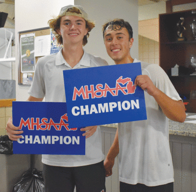  Seaholm seniors Nick Kelley, left, and Ricky Sparby, right, took first in the flight No. 4 doubles at the MHSAA Division 2 State Finals in Midland Oct. 15.  