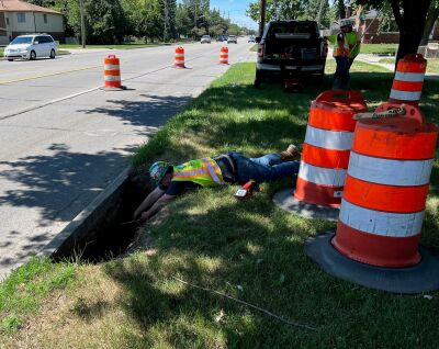  A rotting pipe led to the formation of a sinkhole on 10 Mile Road near Loretta Avenue in Warren. 