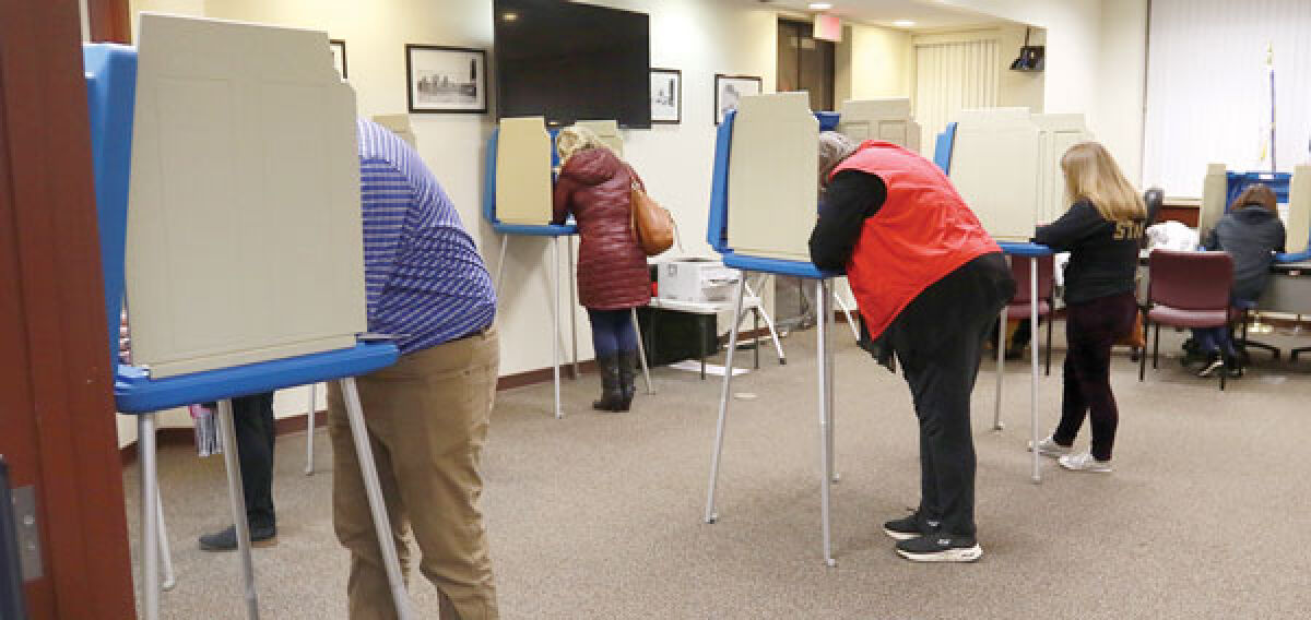  Voters are pictured at polling stations at Keego Harbor City Hall for the general election Nov. 8. Aside from matters pertaining to the state, residents had local issues and candidates to consider. 