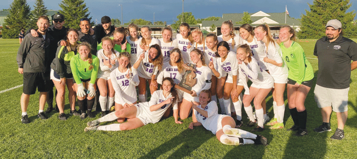  Bloomfield Hills High School girls soccer celebrates its first-ever regional championship following a 2-1 victory over Hartland High June 9 at Novi Meadows. 