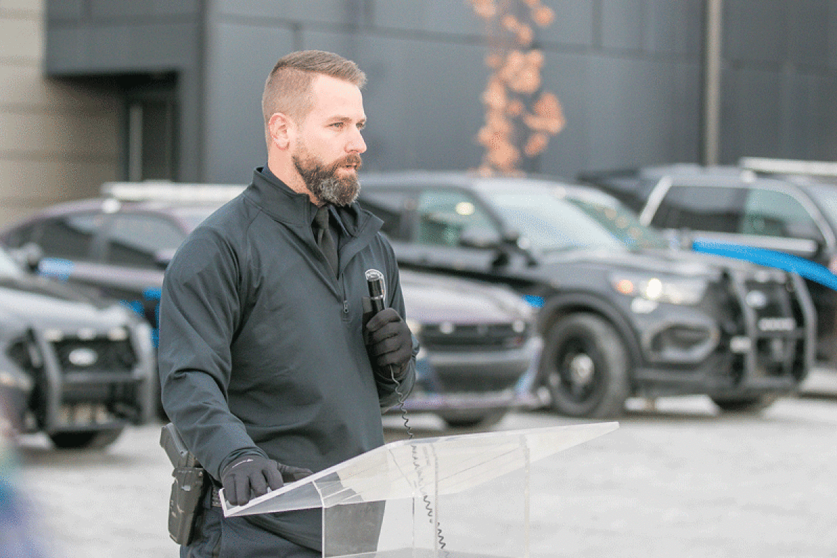  Bloomfield Township police Officer Nick Soley speaks during the “Tie One On for Safety” campaign kickoff Nov. 21. The Bloomfield Township Police Department, in partnership with Mothers Against Drunk Driving and M1 Concourse, hosted the event to stand in solidarity against impaired driving, especially during the holidays.  