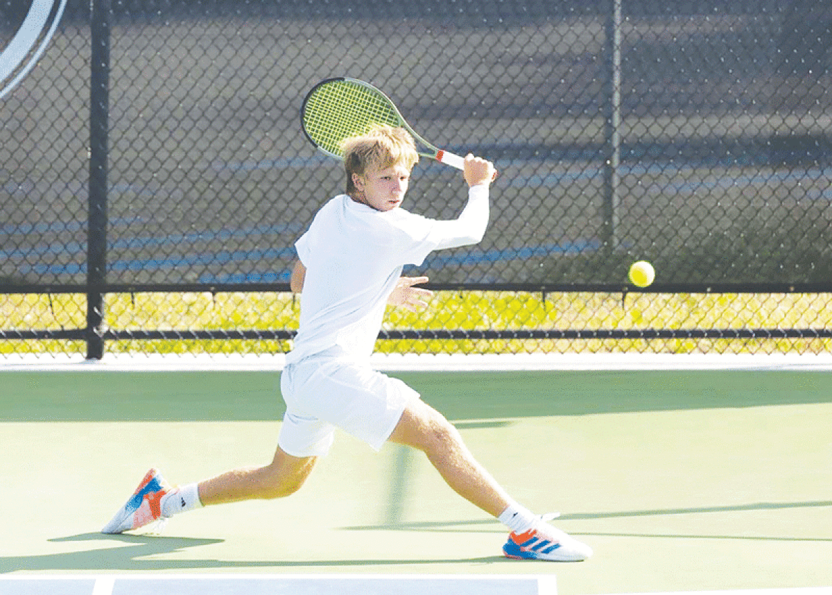  Bloomfield Hills Cranbrook Kingswood senior Owen DeMuth performs a backhand shot at the Michigan High School Athletic Association Division 3 State Championship Oct. 15. 