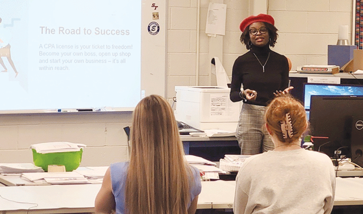  Angel Stallings, the Detroit Piston’s CPA and a member of the MICPA, tells students about the shortage of CPAs in Michigan despite it offering varied opportunities and above-average pay. 
