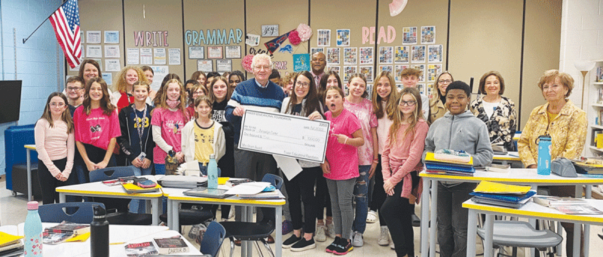  Jacquelyn Carter, an English language arts teacher at Richards Middle School, received $1,000 to enhance classroom libraries with high-interest books in seventh grade and eighth grade classrooms. 