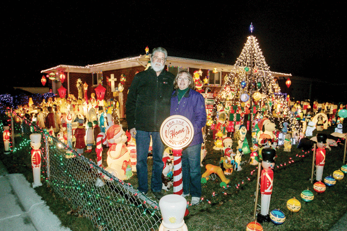  Ron and Gina Jenkins decorate their home on Frazho Road, west of Ryan Road, every year with 850 Christmas blow mold lawn decorations.  