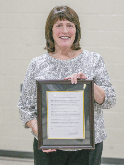  A resolution from the Center Line Public Schools Board of Education was presented to Eve Kaltz. 