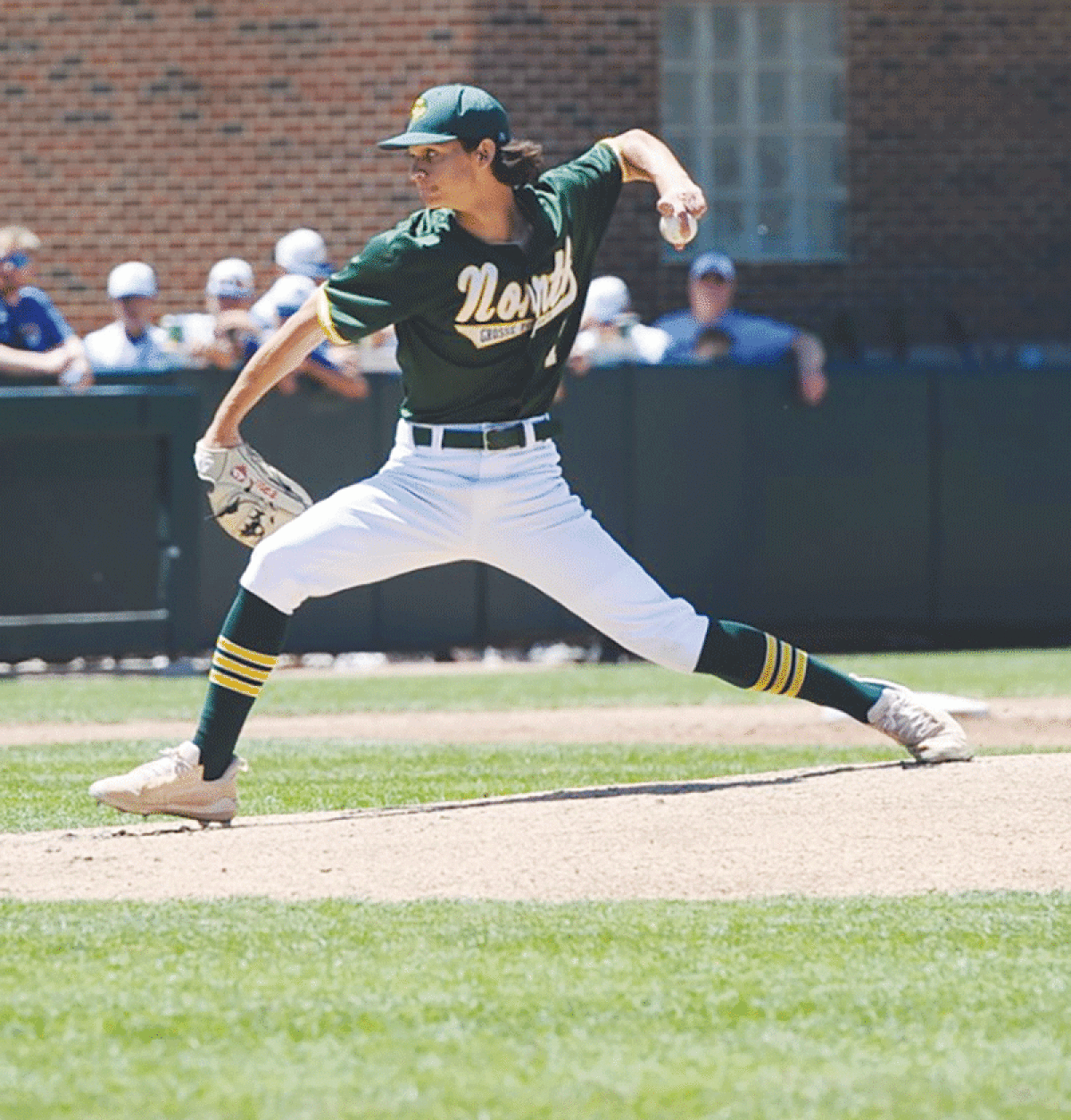  Grosse Pointe North High School sophomore Brennan Hill pitches during North’s 1-0 loss to Orchard Lake St. Mary’s in the Michigan High School Athletic Association Division I state championship game at Michigan State University’s McLane Stadium June 18. 