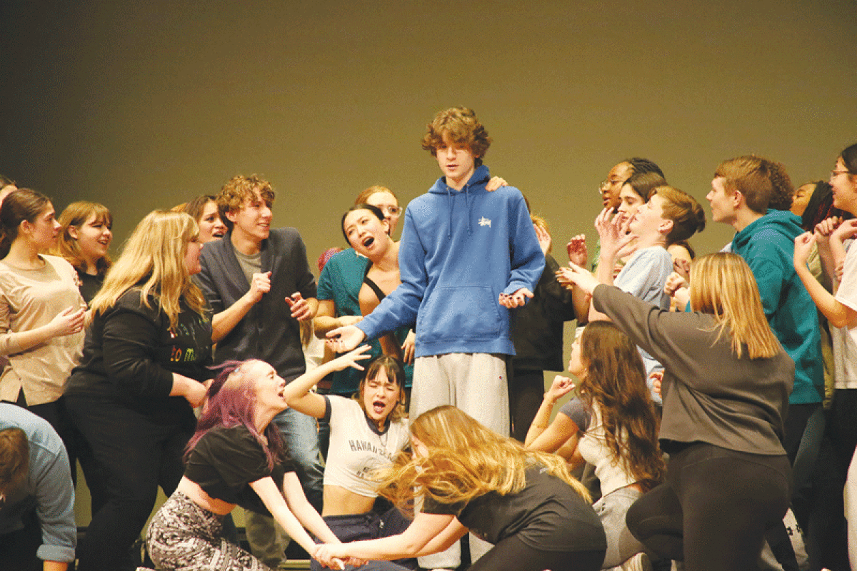  In rehearsal, Ashton Posner as Shrek is surrounded by the many fantasy creatures as they plead for his help getting their home — and his privacy — back from Lord Farquaad.  